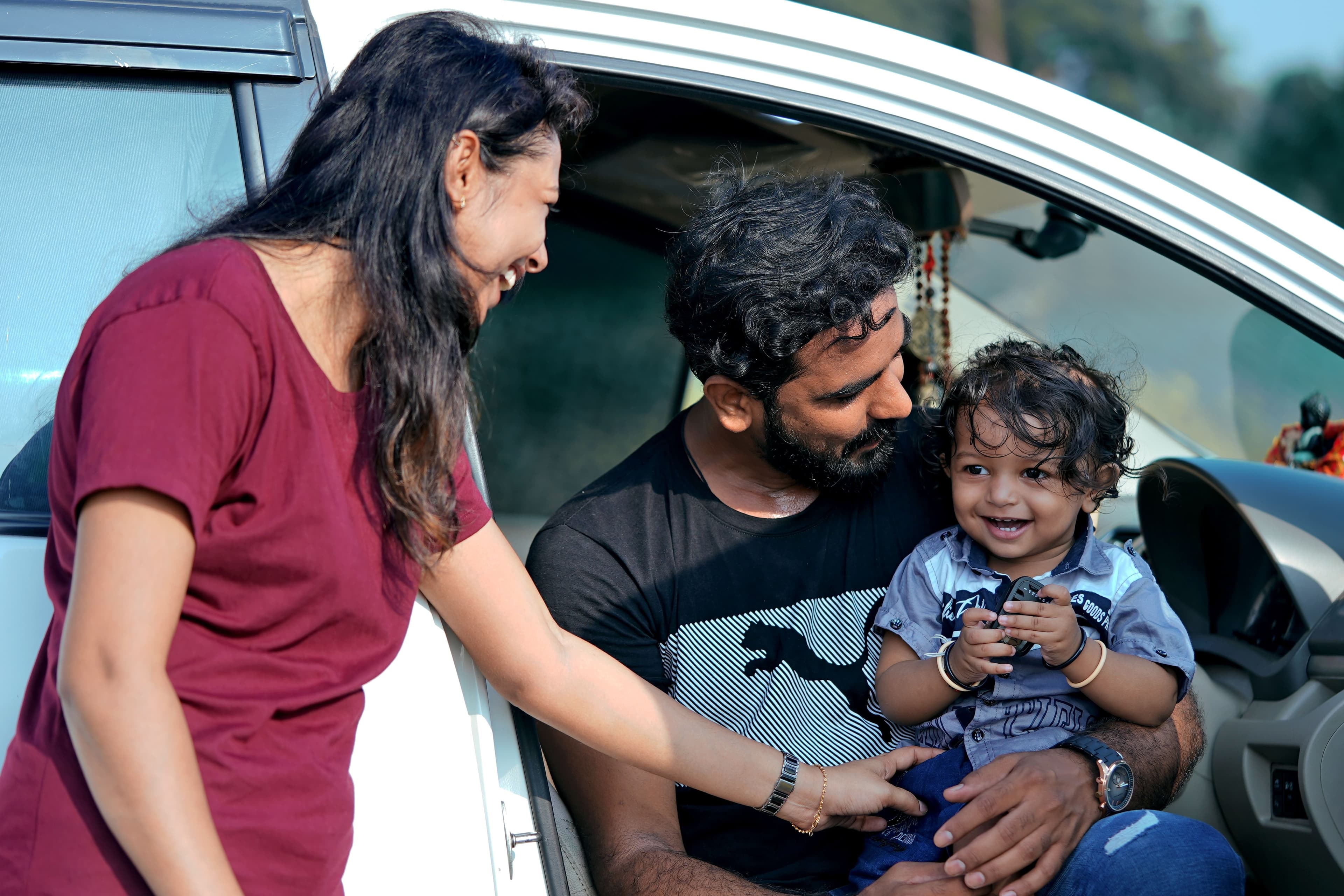 Young child sitting safely in a car seat — BabyCosts Australia