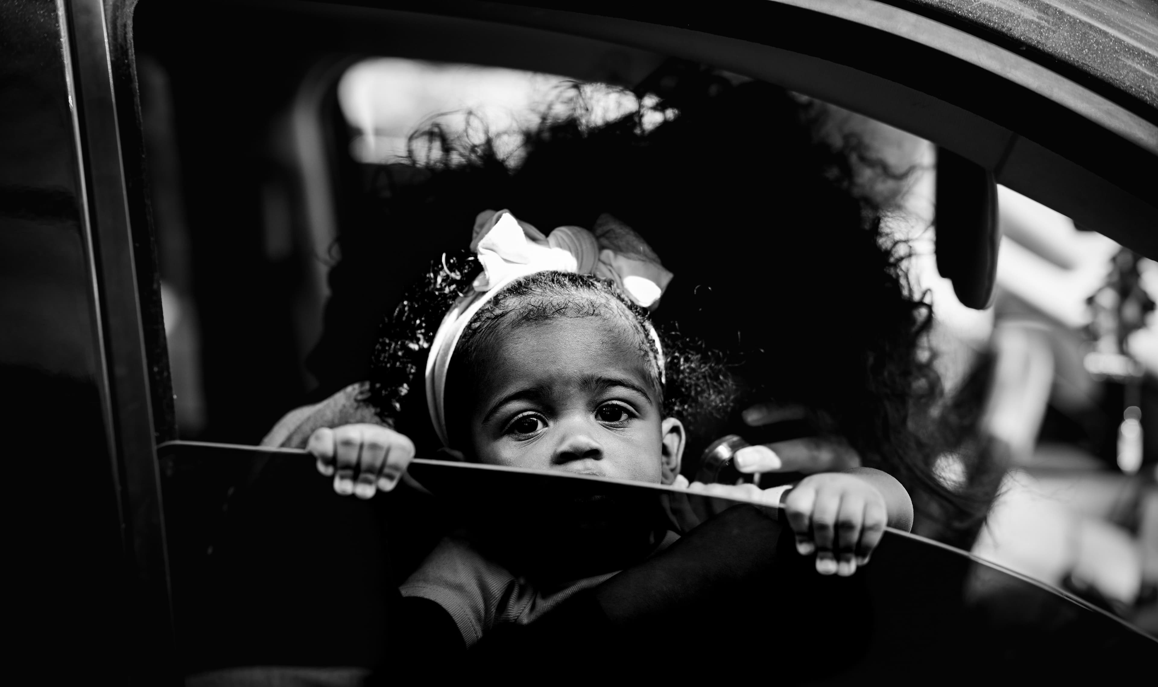 Young child sitting safely in a car seat — BabyCosts Australia