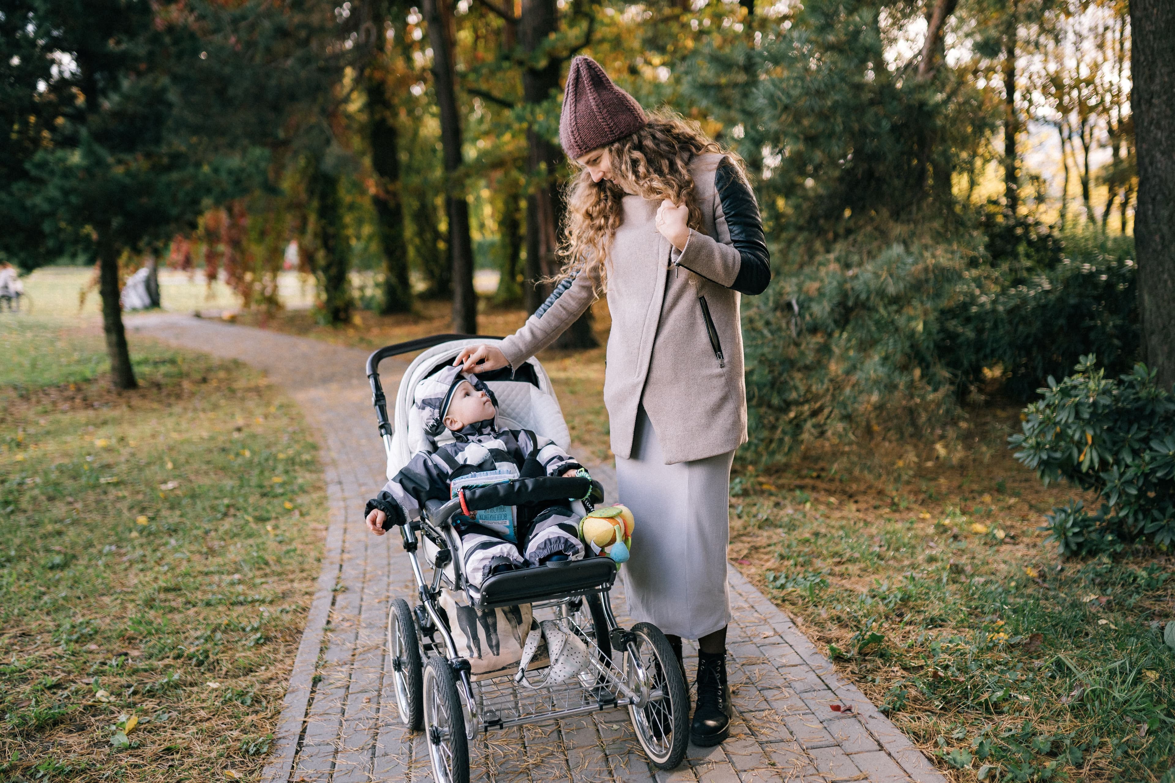 Mother and baby sharing a joyful moment outdoors — BabyCosts Australia